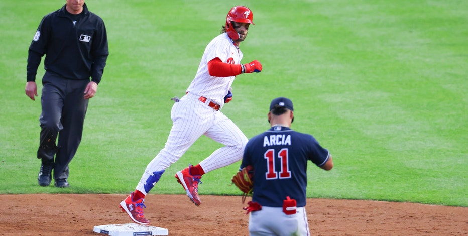 Bryce Harper crushes two homers, drives in four in Phillies' 10-2 victory  over Braves