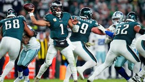 Jalen Hurts shakes off knee injury and leads Eagles past Cowboys 28-23 for NFL best 8-1 mark