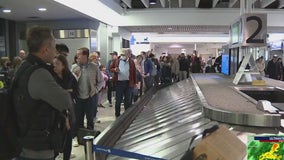 Thousands endure rainy weather on busy travel day ahead of Thanksgiving