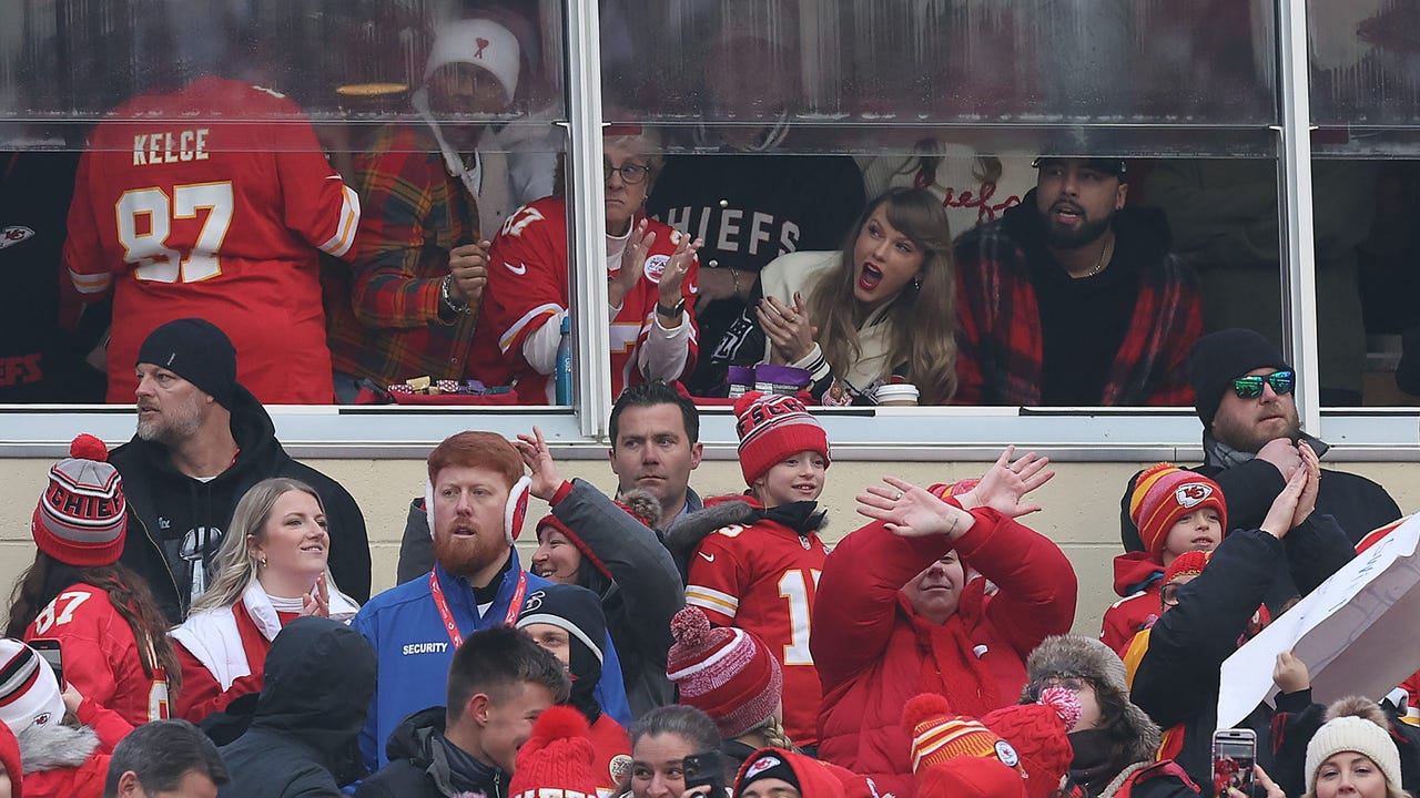 Taylor Swift and Travis Kelce ring in the new year at Chiefs game