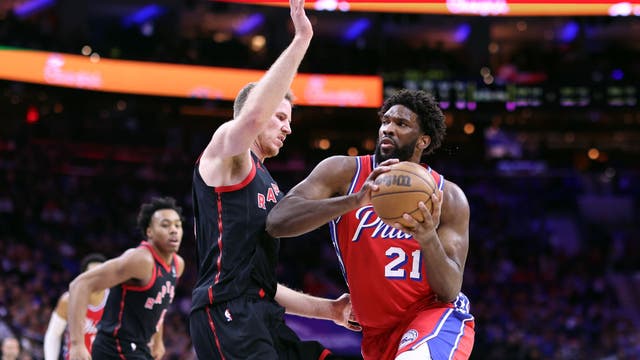 Embiid plays through ankle injury to extend 30-10 streak to 13, Sixers beat Raptors 121-111