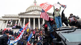 Teenage Capitol rioter who pepper-sprayed police with Confederate flag in hand sentenced