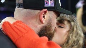 Taylor Swift greets Super Bowl-bound Travis Kelce with a kiss after Chiefs win the AFC title game