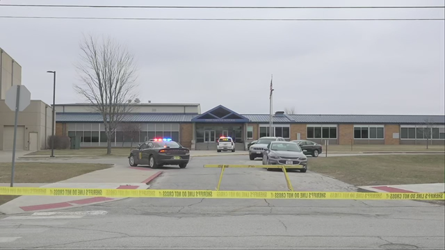 Perry High School shooting: Principal who risked his life to protect students has died