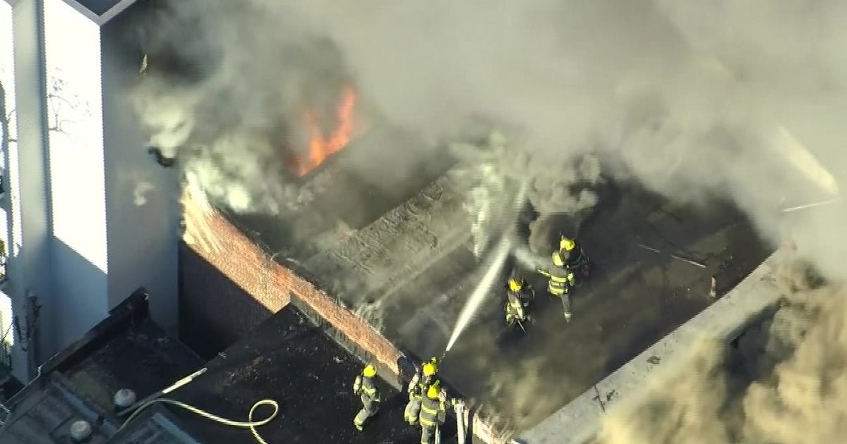 14 displaced after 120 firefighters battle massive Philadelphia fire ...