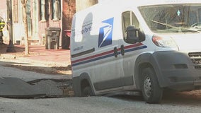 Giant sinkhole nearly swallows postal van in Wilmington