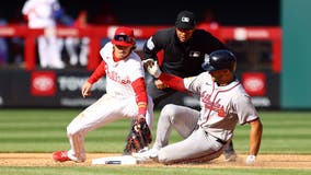 Braves rally for seven in the eighth to begin defense of NL East crown with 9-3 win over Phillies