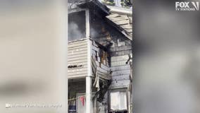 Firefighter rescues cat from smoldering house in Connecticut