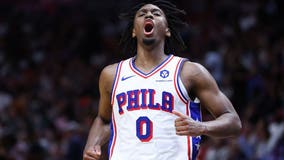 Maxey scores 37, Embiid has 29 and Philadelphia rallies past Miami 109-105 to tighten East race