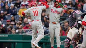 Realmuto homers after an intentional walk to Harper to help Phillies beat Nationals 5-2