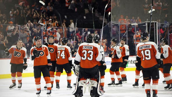 Oshie scores game-winner into empty net as Capitals make playoffs by beating Flyers