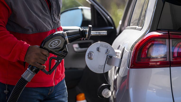 FILE - A customer pumps gas at a gas station in Hercules, California, on March 14, 2024. Photographer: David Paul Morris/Bloomberg via Getty Images