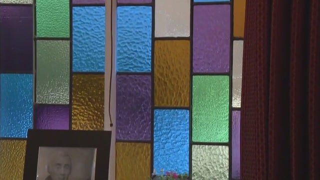 Historic church windows repaired, rededicated after vandal shattered them