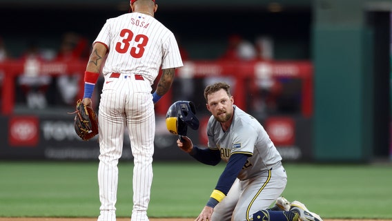 Hoskins homers in return to Philly, but Dahl goes deep in Phillies debut to key 3-1 win over Brewers