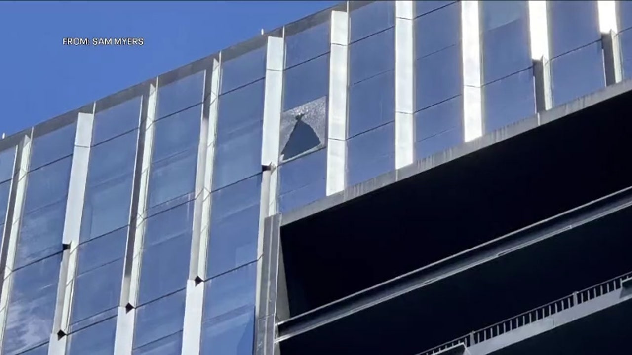 Glass windows shattering at Riverwalk Apartments in Center City