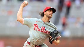 Trea Turner homers twice, Aaron Nola gets 100th career win in Phillies' 8-6 victory over Braves