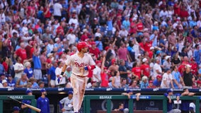 Turner hits grand slam, Wheeler exits with back stiffness in Phillies' 10-1 win over Dodgers