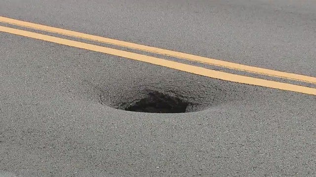 Sinkhole rattles houses in Port Richmond, creating dangerous traffic issues, according to residents
