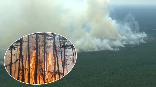 NJ wildfire sparked by Fourth of July fireworks is 90% contained at 4,300 acres