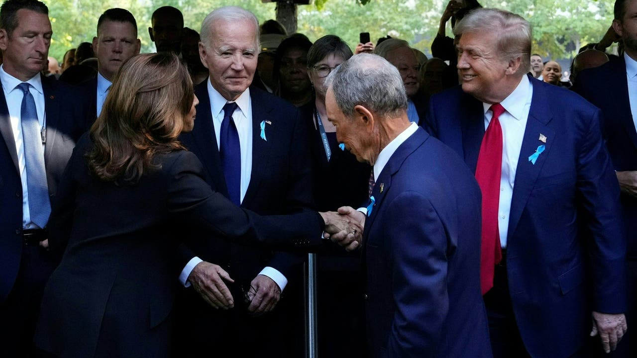 Harris and Trump shake hands and stand together during the 9/11 ceremony at Ground Zero