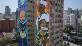 Jalen Hurts and Jordan Love depicted on 108-foot-high mural in Sao Paulo