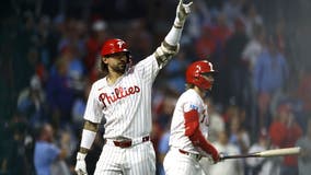 Castellanos homers as the Phillies beat the Cubs 9-6 and clinch first-round bye in playoffs