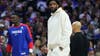 Embiid drawing criticism for sitting out 76ers' opener as part of health plan to reach the playoffs