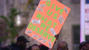 Philadelphia's largest blue-collar workers union flood streets near City Hall, vote to authorize strike