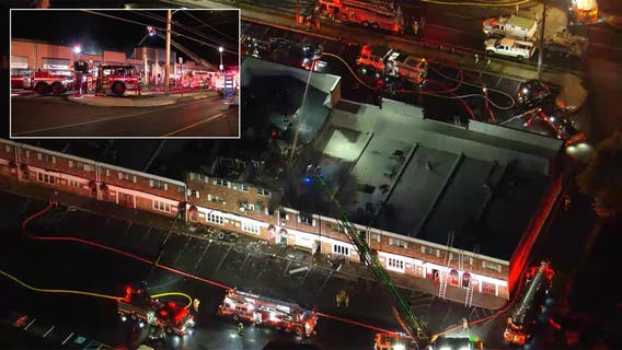 More than 70 firefighters battle large blaze at strip mall in Bensalem