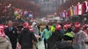 Thanksgiving Day Parade goers in Philadelphia look on the bright side despite showers