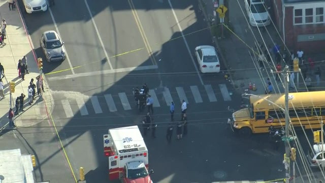 Driver of motor scooter killed after hitting traffic light, parked car and school bus
