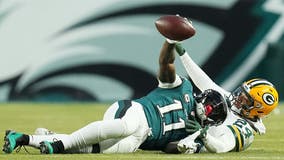 A.J. Brown reads inspirational book on sideline during Eagles playoff win
