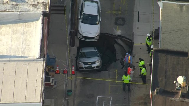 Video: Massive sinkhole swallows vehicle in Port Richmond