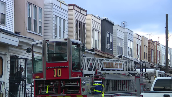 Elderly man dies in Kensington house fire as woman rescued from roof