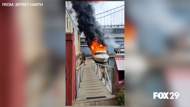 Boat fire at Cherry Street Pier creates plume of black smoke