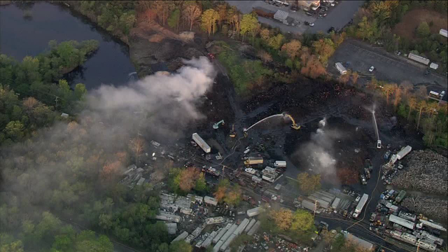 Fire at New Jersey mulch yard still smoldering after intense blaze prompts evacuations