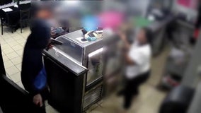 Watch: Philadelphia restaurant owner robbed at gunpoint with her children nearby