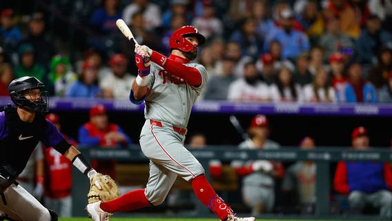 Schwarber hits 300th homer as Phillies rally past Rockies to move into 1st place