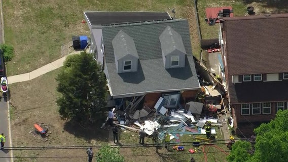 Dump truck crashes into house in Woodbury Heights, causing major collapse: officials