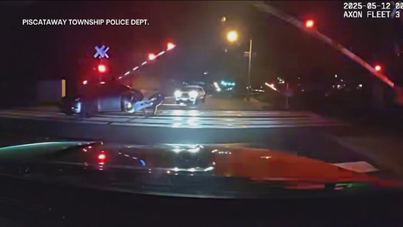 NJ officers save driver from oncoming train in dramatic video