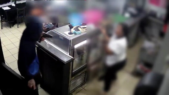 Watch: Philadelphia restaurant owner robbed at gunpoint with her children nearby