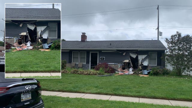 Juvenile fleeing police smashes into Bucks County home, causes 'catastrophic' damage