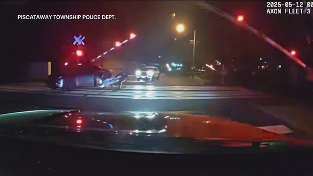 NJ officers save driver from oncoming train in dramatic video