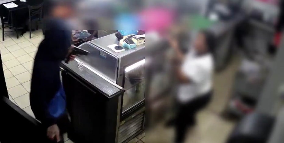 Watch: Philadelphia restaurant owner robbed at gunpoint with her children nearby