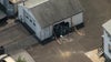 Chain-reaction crash sends car into building, injures driver in Bucks County