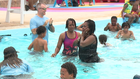 Mayor Parker takes a dive to open Philly city pools