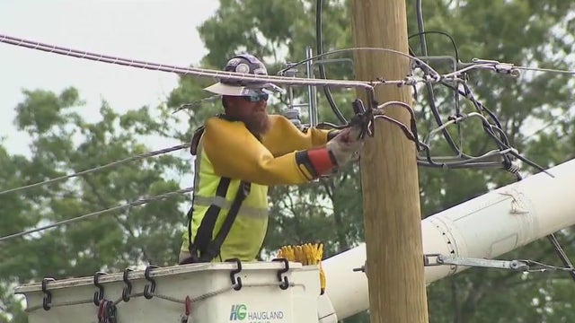 Power companies work nonstop to restore power after severe storms topple trees, power lines