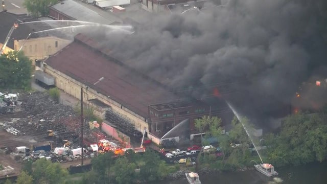 5-alarm fire rips through automotive warehouse in Philadelphia