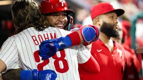 Phillies wrap up a 1st-round bye, hitting a team-record 8 homers to rout the Marlins