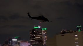 Why were military helicopters flying over Philadelphia on Thursday night?